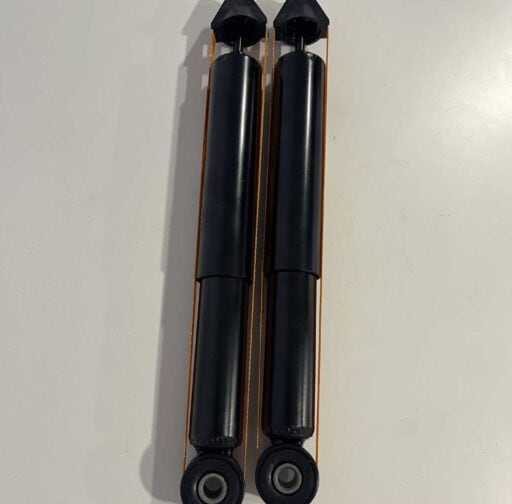 Heavy-duty car shock absorbers for performance vehicle suspension upgrade, designed for durability and enhanced handling. Suitable for automotive enthusiasts seeking optimized ride quality.