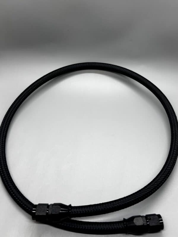 3 AN black hose with straight fittings for automotive or industrial use, flexible and durable, suitable for high-performance applications.