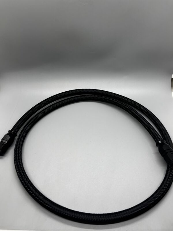 3 AN black hose with straight fittings, ideal for performance automotive applications, displayed on a white background.